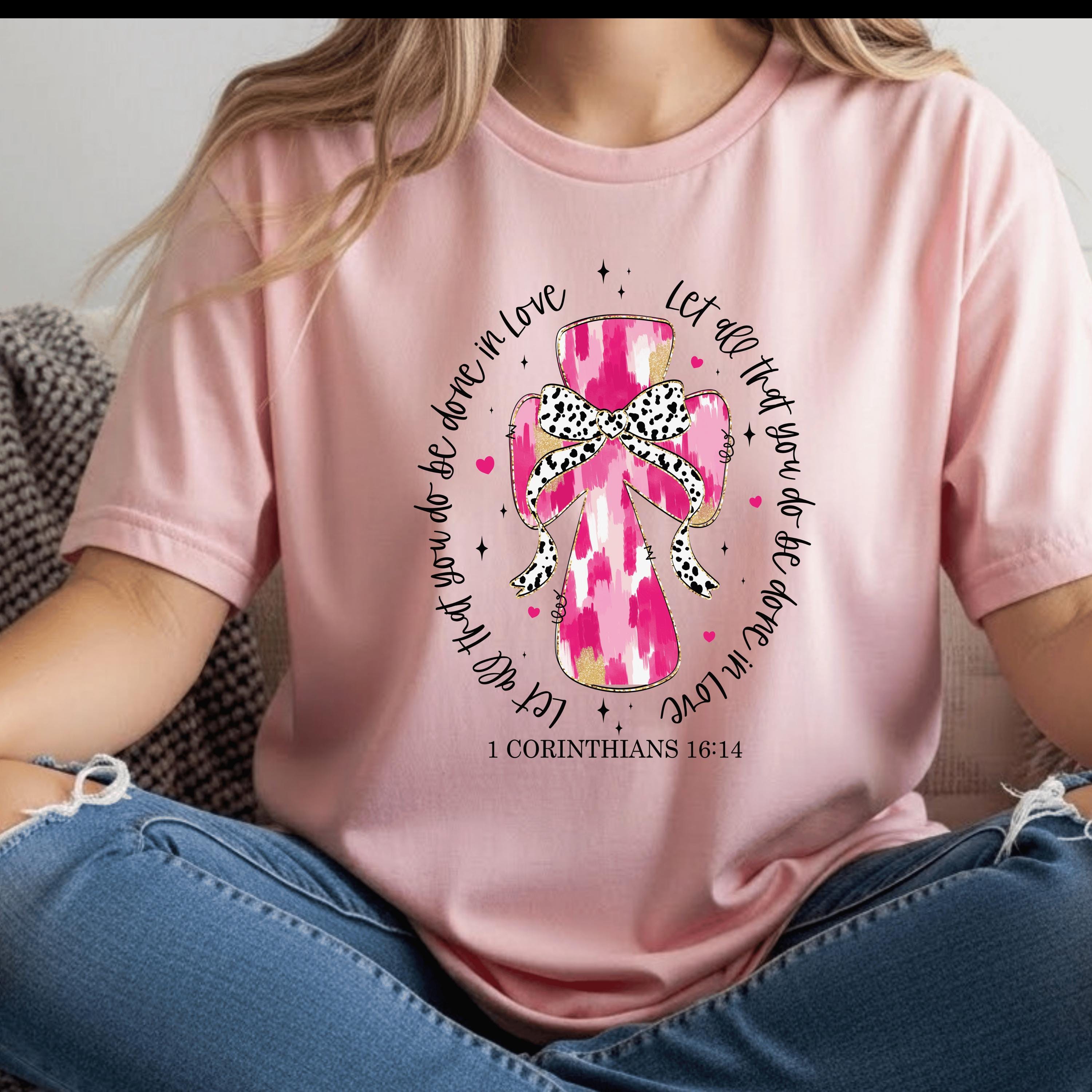 A Cross and bow on a Bella Canva T-Shirt with Scripture for Valentines