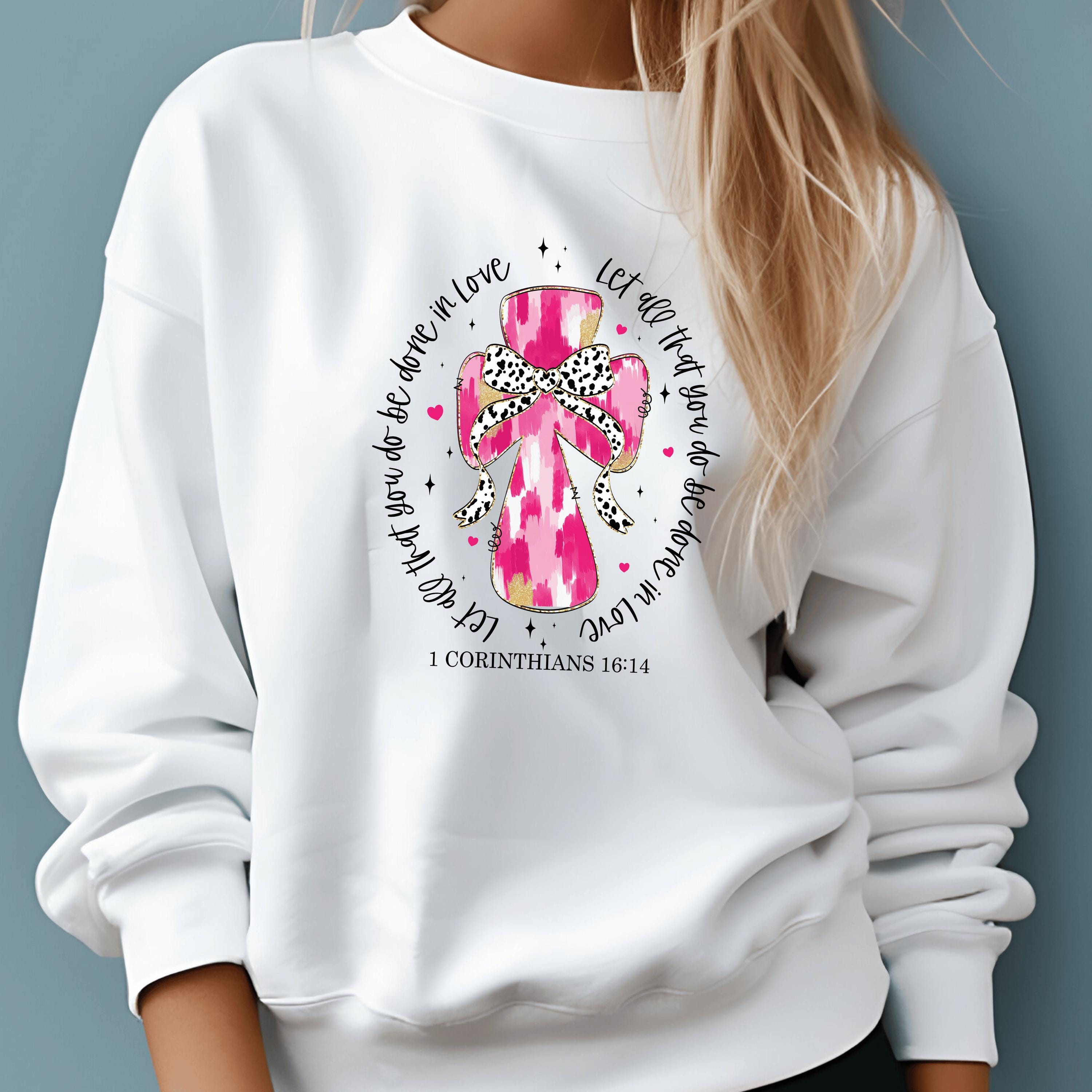 A Cross and bow on a Bella Canva T-Shirt with Scripture for Valentines